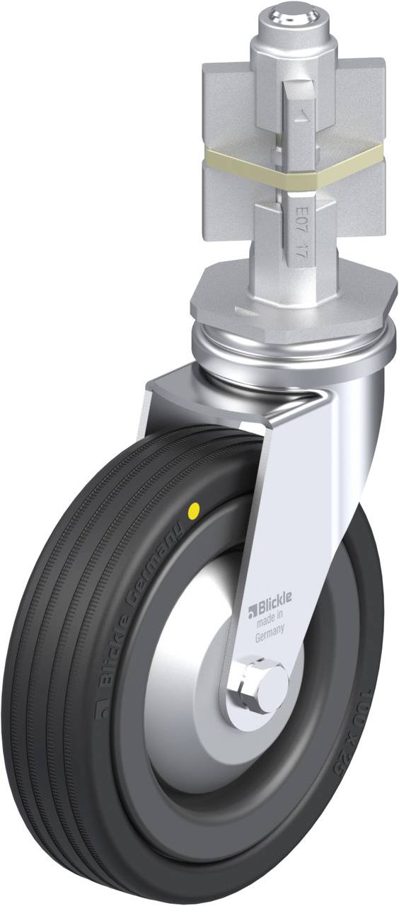 Industrie-Lenkrolle mit grauem Gummirad, silbernem Gehäuse und gelbem Punkt, geeignet für schwere Lasten und flexible Manövrierbarkeit.