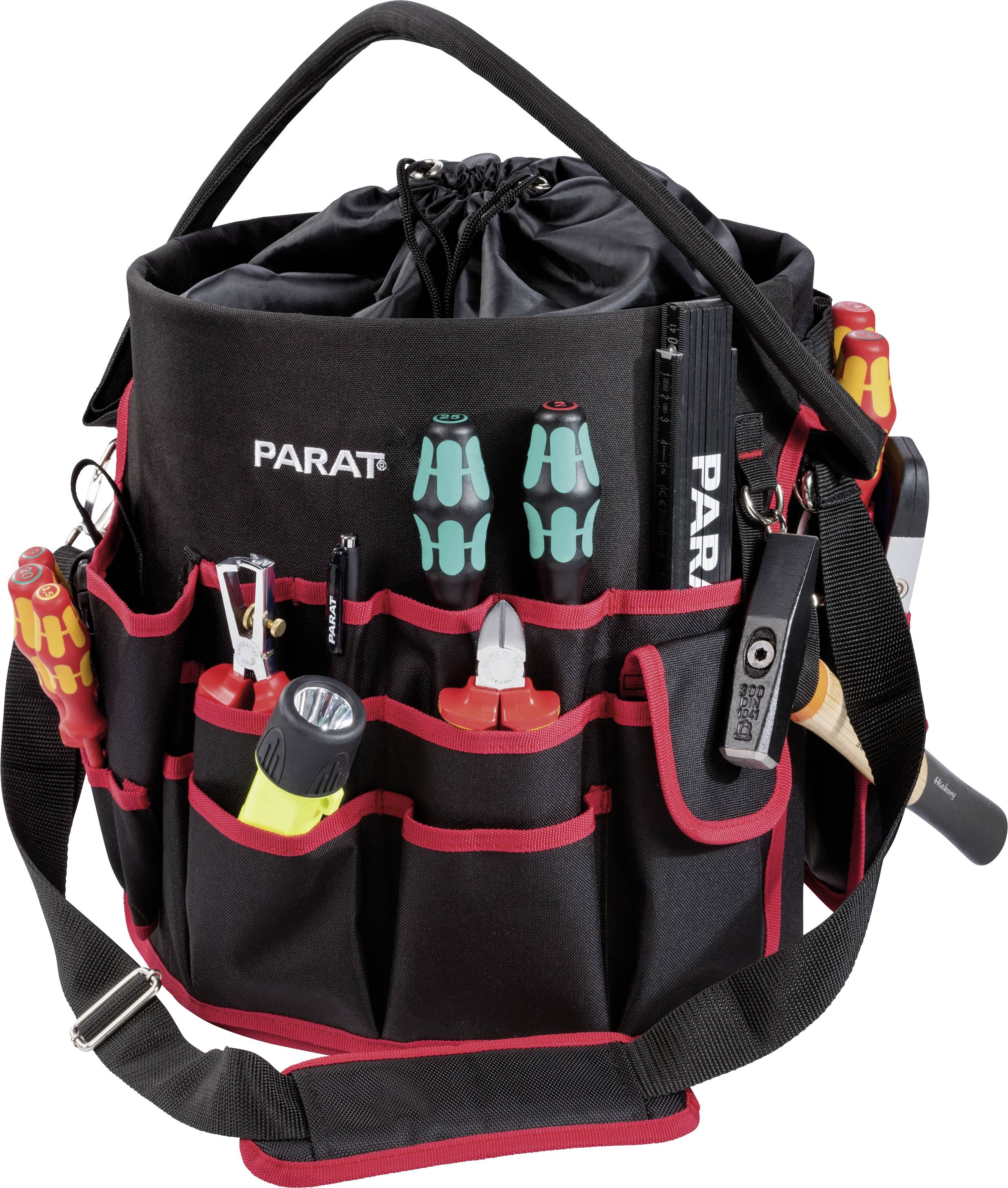 Eine schwarze Werkzeugtasche mit roten Nähten, gefüllt mit verschiedenen Werkzeugen wie Schraubendrehern, Zangen und Maßband, daneben ein verstellbarer Schulterriemen.
