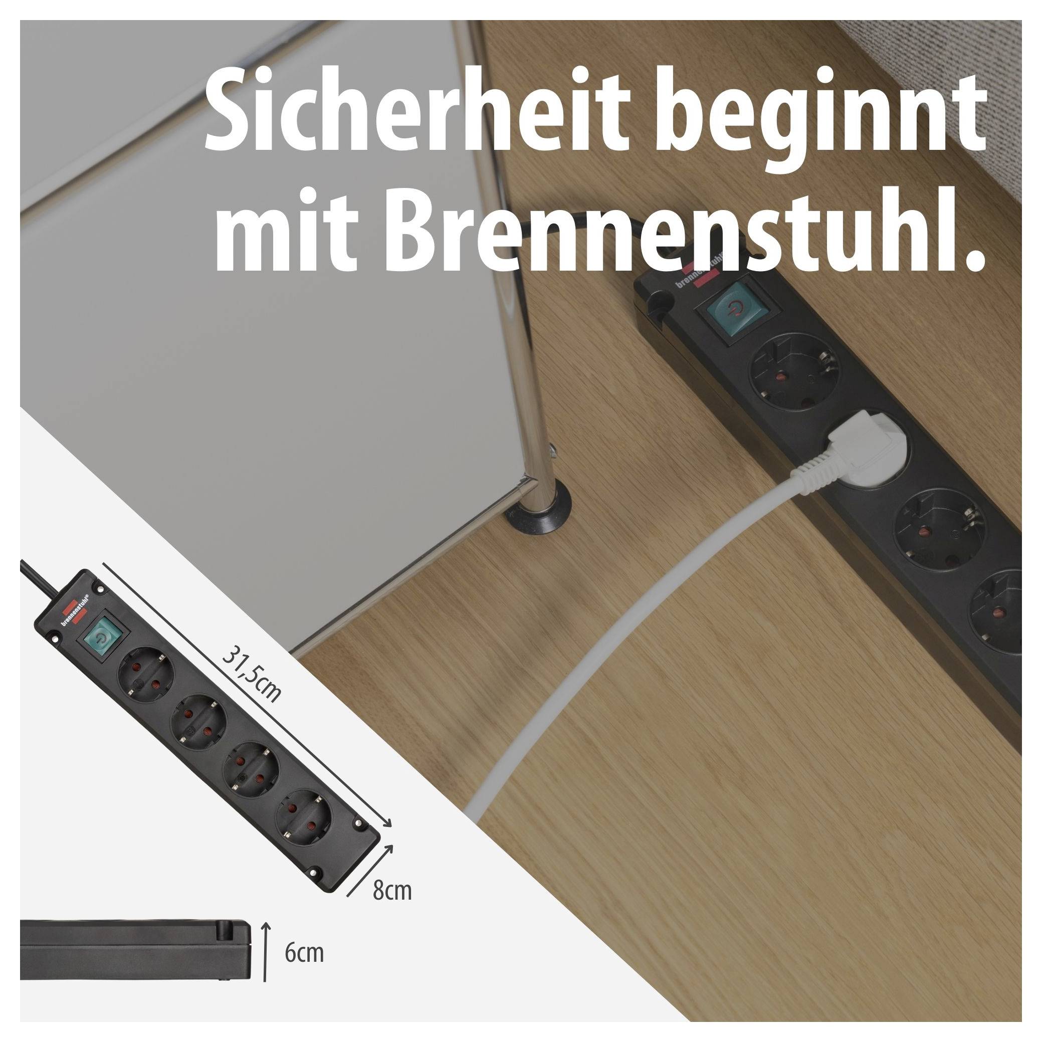 Werbung für eine Brennenstuhl-Steckdosenleiste: schwarze Leiste am Schreibtisch mit Kabel, Text 'Sicherheit beginnt mit Brennenstuhl.', Maße 31,5 cm, 8 cm, 6 cm.