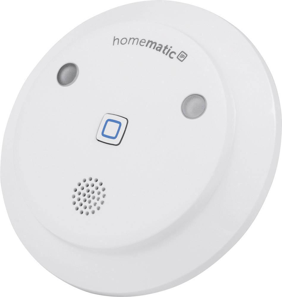 Ein runder, weißer Rauchmelder mit zwei Sensoren und einem blauen Testknopf in der Mitte. Oben ist das Logo 'homematic IP' erkennbar.