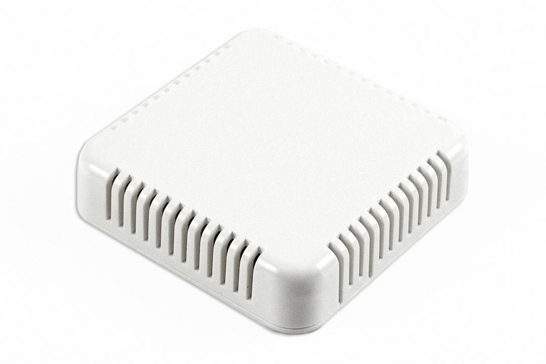 Ein rechteckiger, weißer, an der Wand montierbarer Sensor mit Lüftungsschlitzen auf mehreren Seiten.