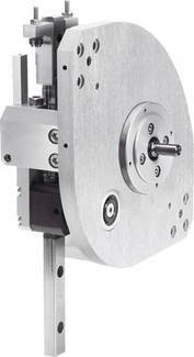 Ein mechanisches Gerät aus silbernem Metall mit runder Scheibe und Welle, vermutlich Teil einer Maschine oder eines Motors.