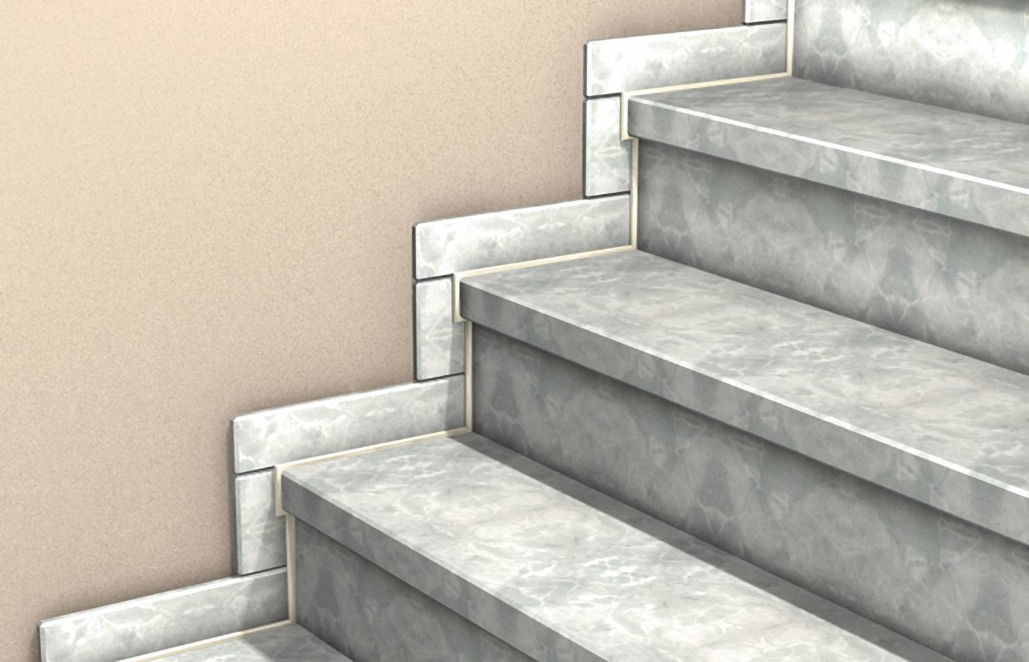 Nahaufnahme von grauen Marmortreppen gegen eine beige Wand, von der Seite betrachtet.