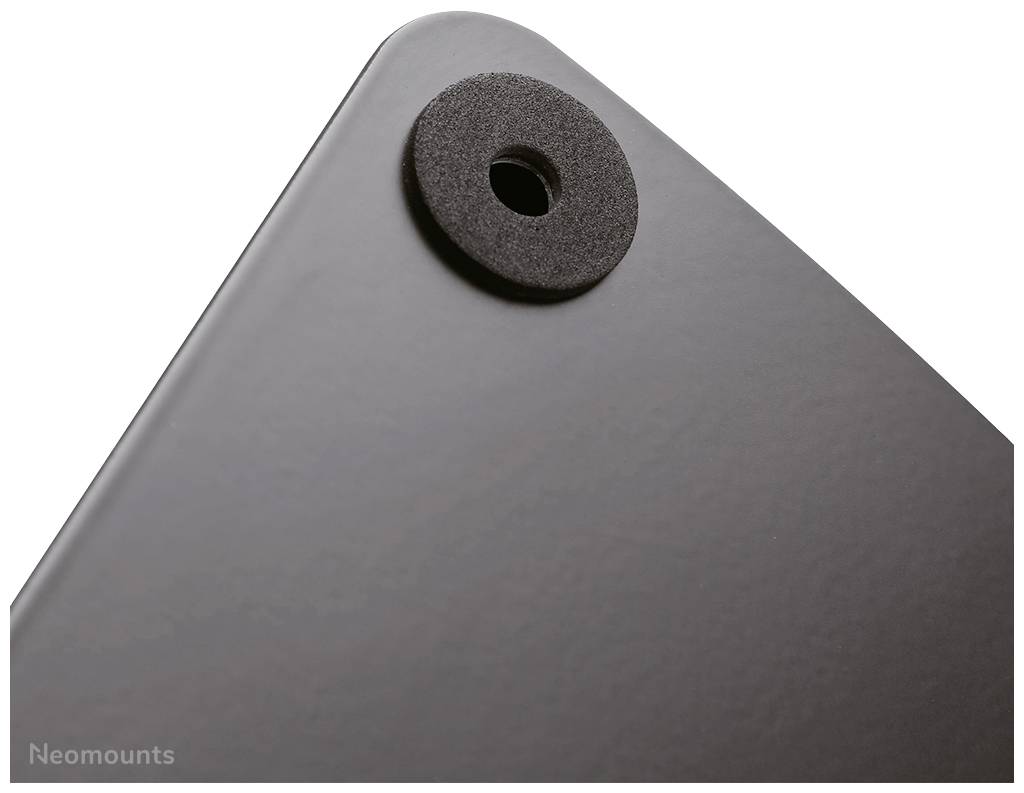 Ecke einer schwarzen Platte mit rundem Loch und Neoprenrand, markiert mit 'Neomounts'.