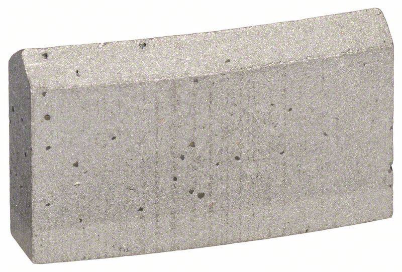 Ein grauer Betonstein mit rechteckiger Form und leicht abgerundeten Kanten. Die Oberfläche ist gleichmäßig und weist kleine Poren auf.