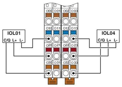 Schaltplan eines elektrischen Anschlusses mit Bezeichnungen IOL01 und IOL04. Verbindungslinien zeigen Anschlüsse und ihre Zuordnungen.