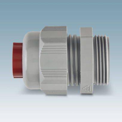 Ein grauer Kabelverschraubung mit einem roten Verschluss, vor einem blauen Hintergrund.