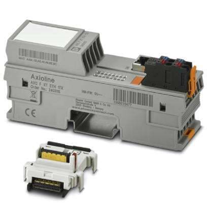 Ein graues elektrisches Modul mit der Aufschrift 'Axioline' und den Anschlüssen oben. Ein kleinerer Steckadapter liegt daneben.