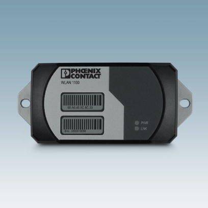 Ein graues elektronisches Gerät der Marke 'Phoenix Contact' mit der Bezeichnung 'WLAN 1100'. Es hat zwei Antennen und LED-Anzeigen.
