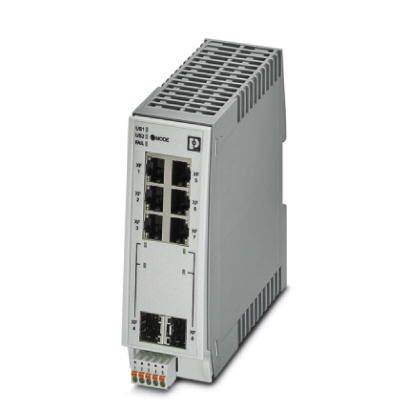 Ein graues Industrie-Ethernet-Switch-Modul mit mehreren Anschlüssen und Lüftungsschlitzen.