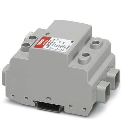 Ein graues elektrisches Gerät mit Anschlüssen und einem Etikett mit technischer Information auf der Oberseite.