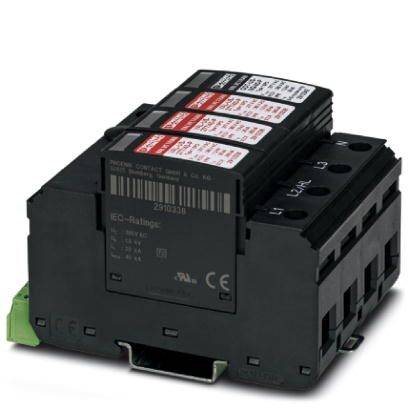 Ein schwarzes elektrisches Bauelement mit mehreren Anschlüssen und Etiketten auf der Oberseite, das zur Steuerung in Schaltschränken verwendet wird.