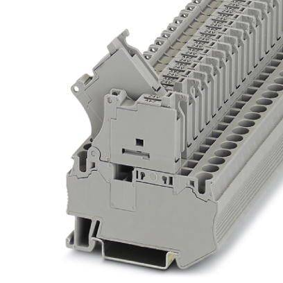 Ein grauer Reihenklemmenblock mit mehreren Anschlussklemmen, geeignet für industrielle elektrische Installationen.