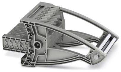 Graues, futuristisches Metallobjekt mit symmetrischen Armen und komplexer Struktur. Mögliche technische oder mechanische Komponente.