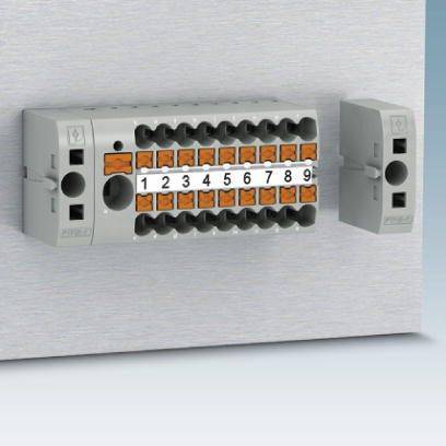 Schalttafel mit nummerierten Anschlussklemmen, in zwei Reihen angeordnet. Jede Klemme ist nummeriert von 1 bis 12, für elektrotechnische Verbindungen.