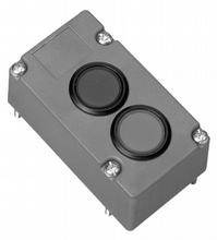 Graues Gehäuse mit zwei schwarzen runden Tasten, übereinander angeordnet. Gehäuse hat vier Schrauben an den Ecken.