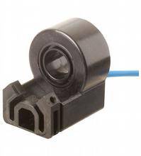 Ein schwarzer Sensor mit einem blauen Kabel ist abgebildet. Der Sensor hat eine runde Form und scheint industriell genutzt zu werden.