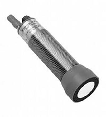 Ein zylindrischer Sensor mit einem Kabelanschluss auf der linken Seite und einer glatten, flachen Oberfläche auf der rechten Seite.