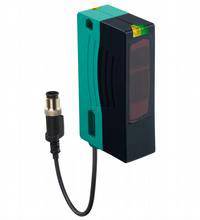 Ein rechteckiger Sensor mit eingebautem Kabel und Stecker, geeignet für industrielle Anwendungen.