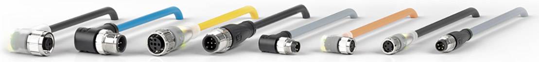 Mehrere industrielle Steckverbinder in verschiedenen Farben und Größen, nebeneinander aufgereiht, liegen auf einer weißen Oberfläche.