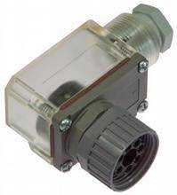 Ein transparenter, rechteckiger Stecker mit einem schwarzen runden Anschluss auf einer Seite, geeignet für industrielle Anwendungen.