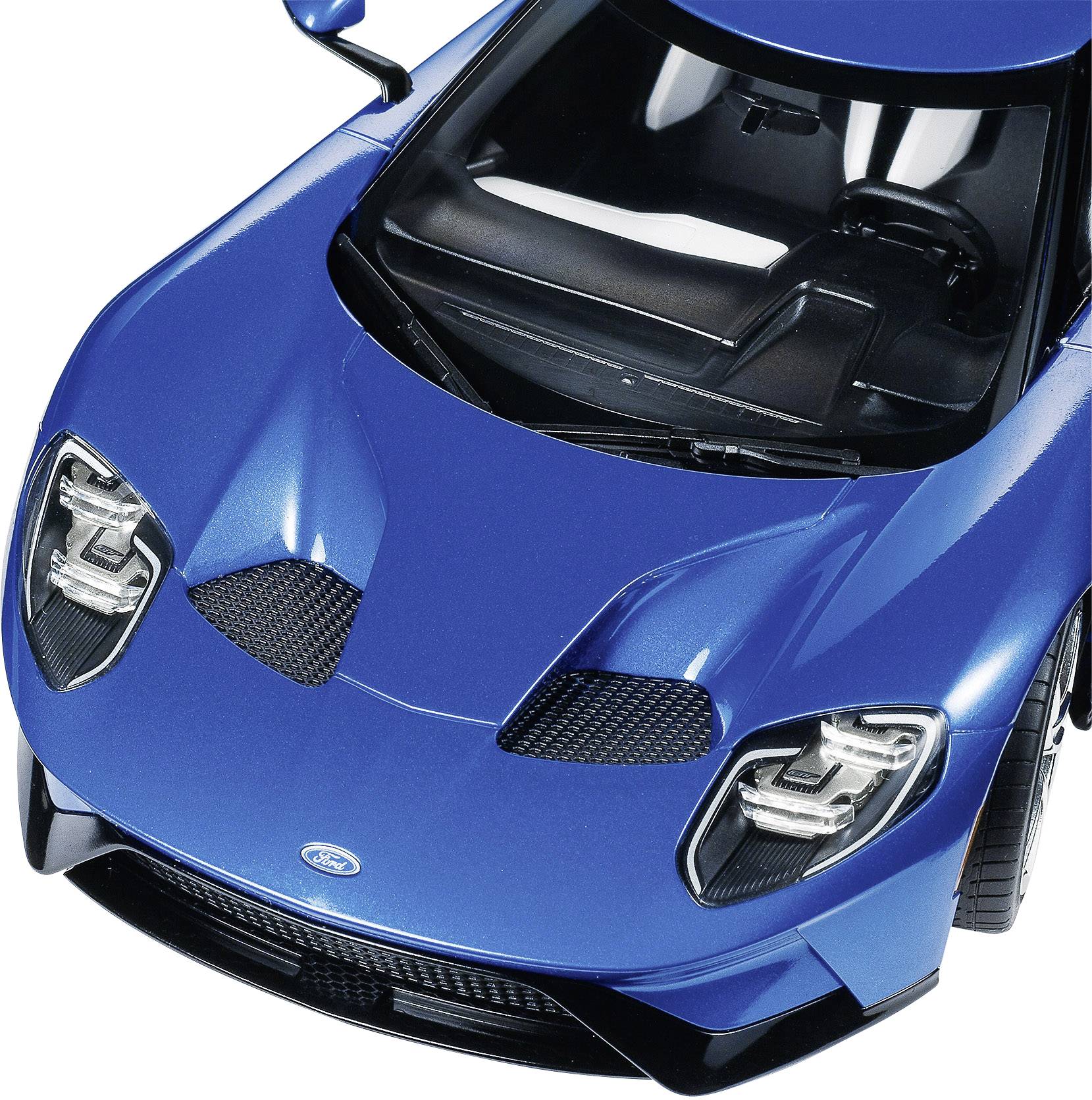 Blauer Sportwagen aus der Vogelperspektive, zeigt Details der Karosserie und Aerodynamik.