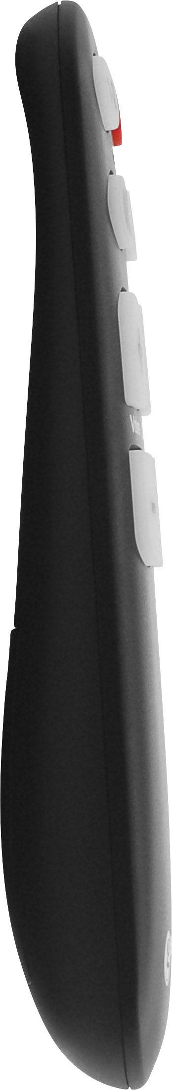 Schwarze Fernbedienung in Seitenansicht mit mehreren Tasten; rotes Detail oben.