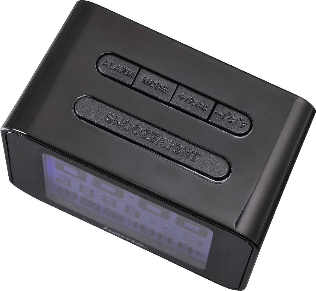 Schwarzer Wecker mit mehreren Knöpfen oben: 'ALARM', 'MODE', '+/RCC', '-/CF', 'SNOOZE/LIGHT'. Digitaldisplay zeigt Uhrzeit und Datum.