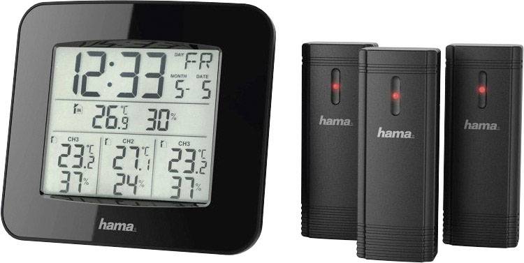 Digitales Thermometer mit Uhrzeit, Datum und Temperaturanzeige. Zeigt 22,3 °C innen und 27,1 °C außen. Zwei schwarze Sensoren daneben.
