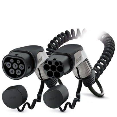 Zwei schwarze und silberne Ladestecker für Elektrofahrzeuge mit spiraligem Kabel und Abdeckung, die auf den Boden zeigt.