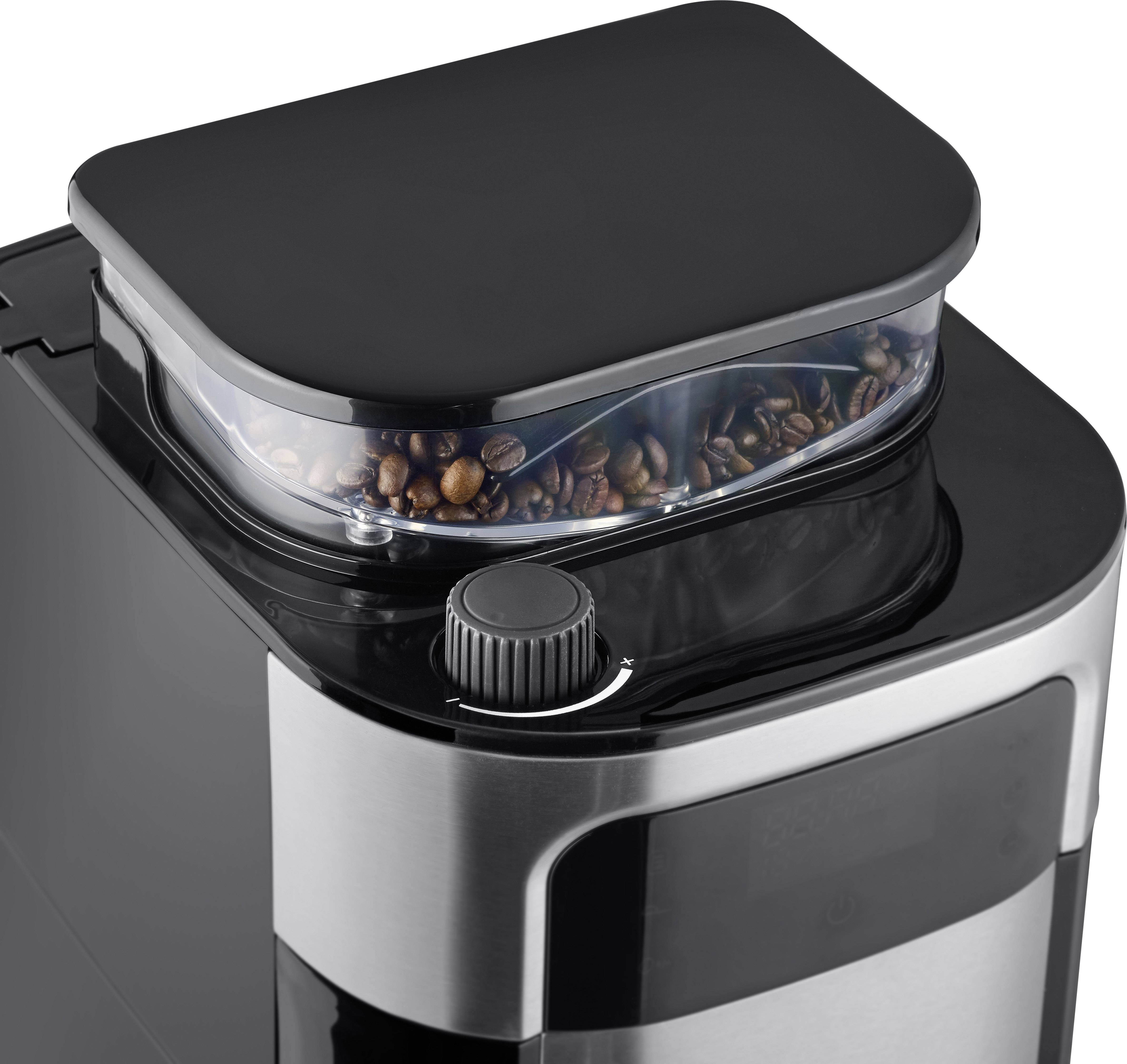 Kaffeemaschine mit integriertem Bohnenbehälter, gefüllt mit Kaffeebohnen, und Drehknopf zur Steuerung der Mahlgrad-Einstellung.