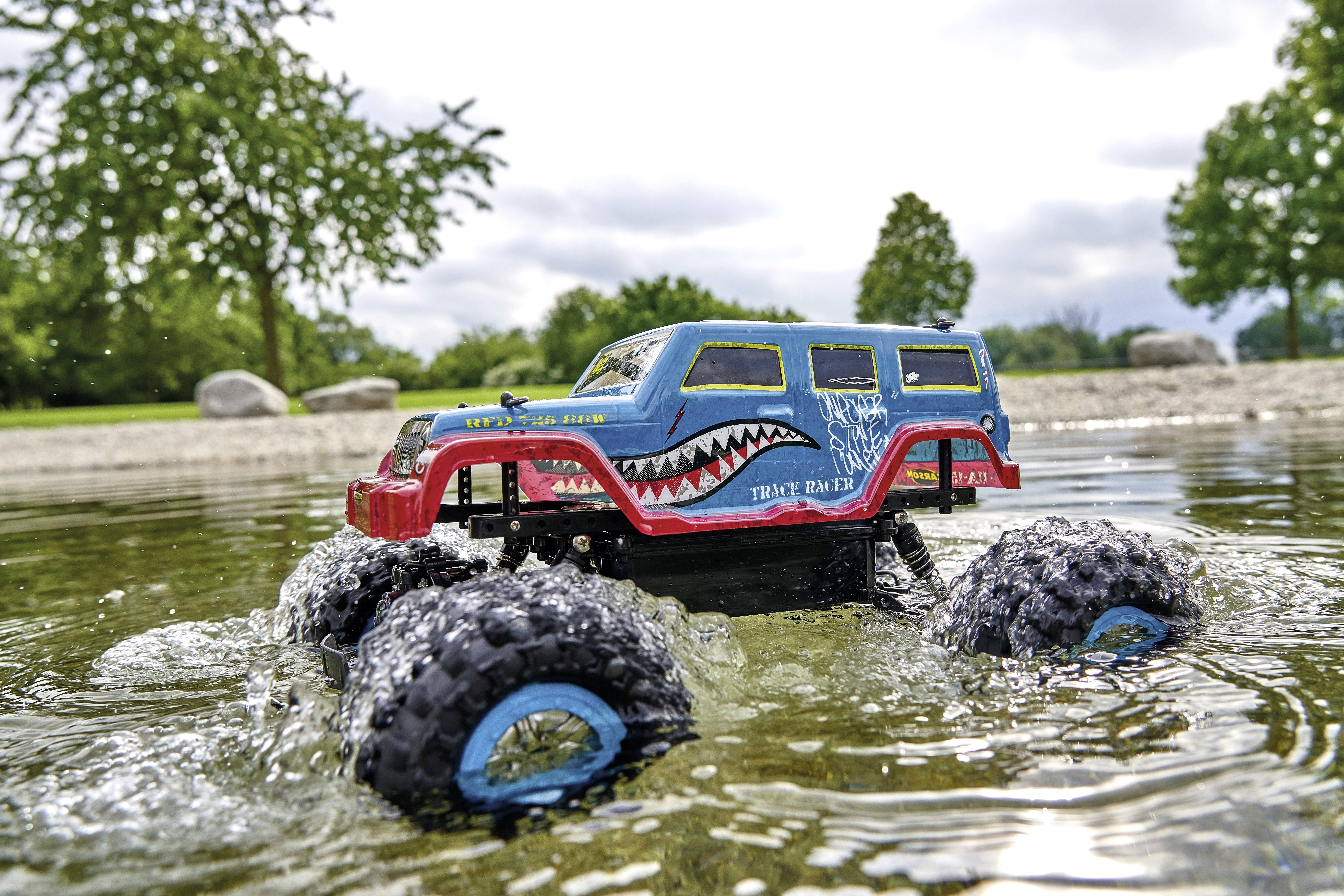 Carson Modellsport Track Racer Blau, Rot 1:10 RC Modellauto Elektro Raupe Allradantrieb (4WD) 2,4GHz inkl. Akku, Ladegerät und