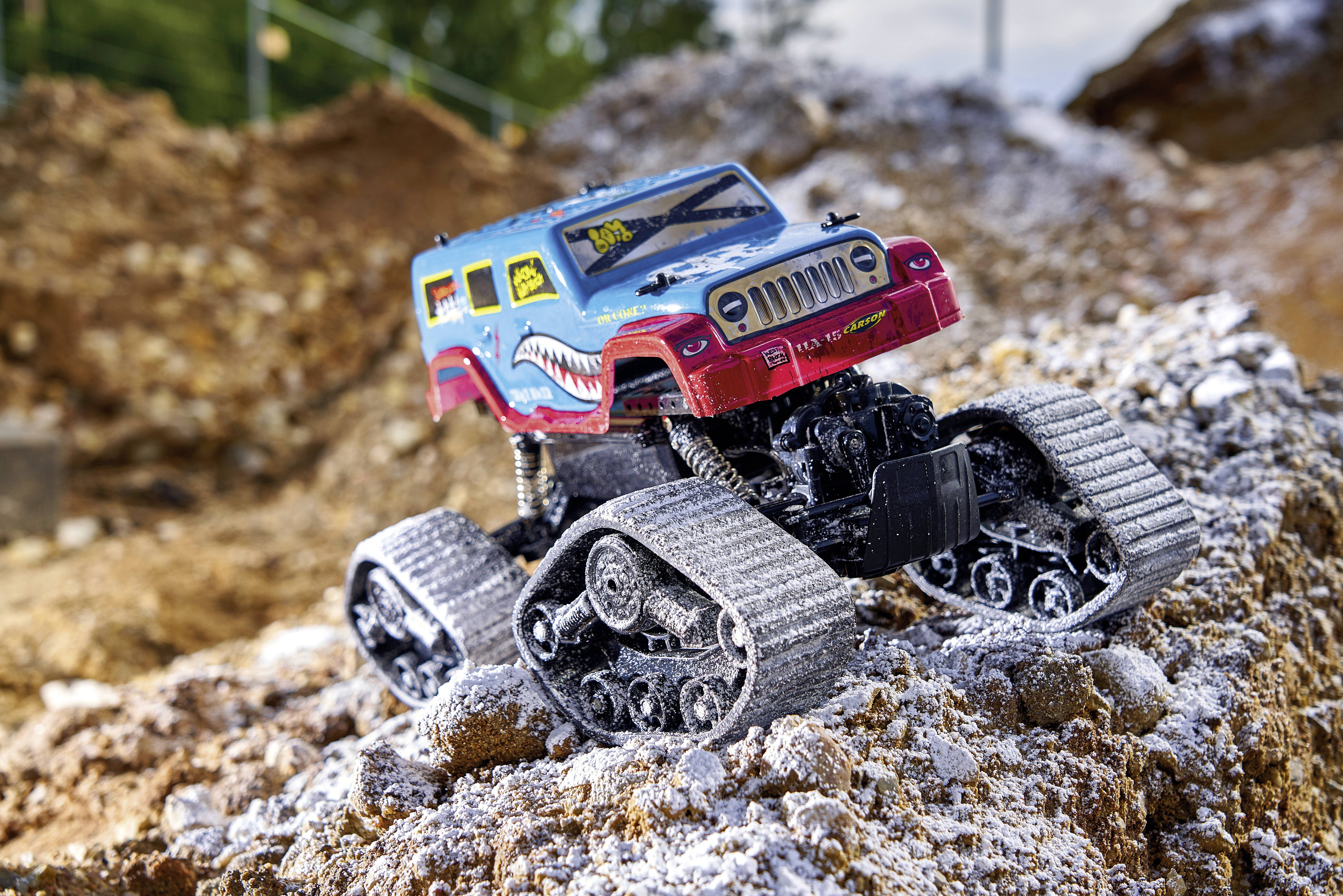 Carson Modellsport Track Racer Blau, Rot 1:10 RC Modellauto Elektro Raupe Allradantrieb (4WD) 2,4GHz inkl. Akku, Ladegerät und