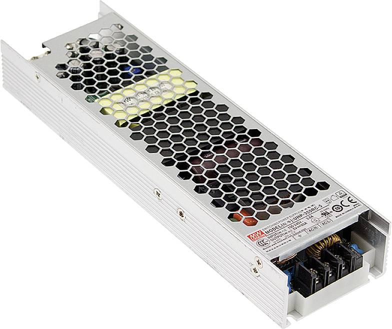 Ein Metallgehäuse mit Wabenmuster, das ein elektronisches Bauteil, möglicherweise ein Netzteil, schützt. Sichtbare Anschlüsse an einer Seite.