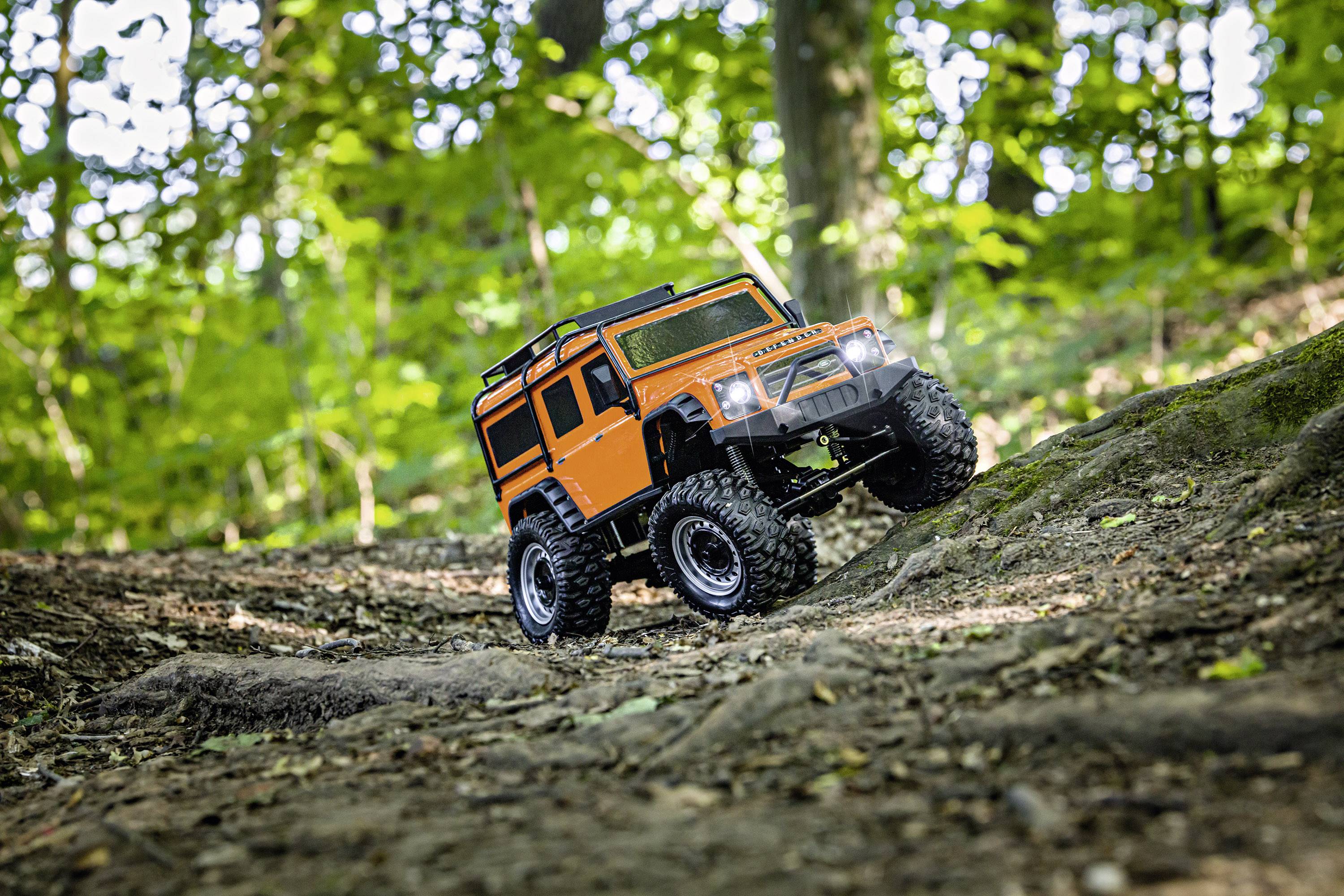 Carson Modellsport Land Rover Defender Orange 1:8 RC Modellauto Elektro ...