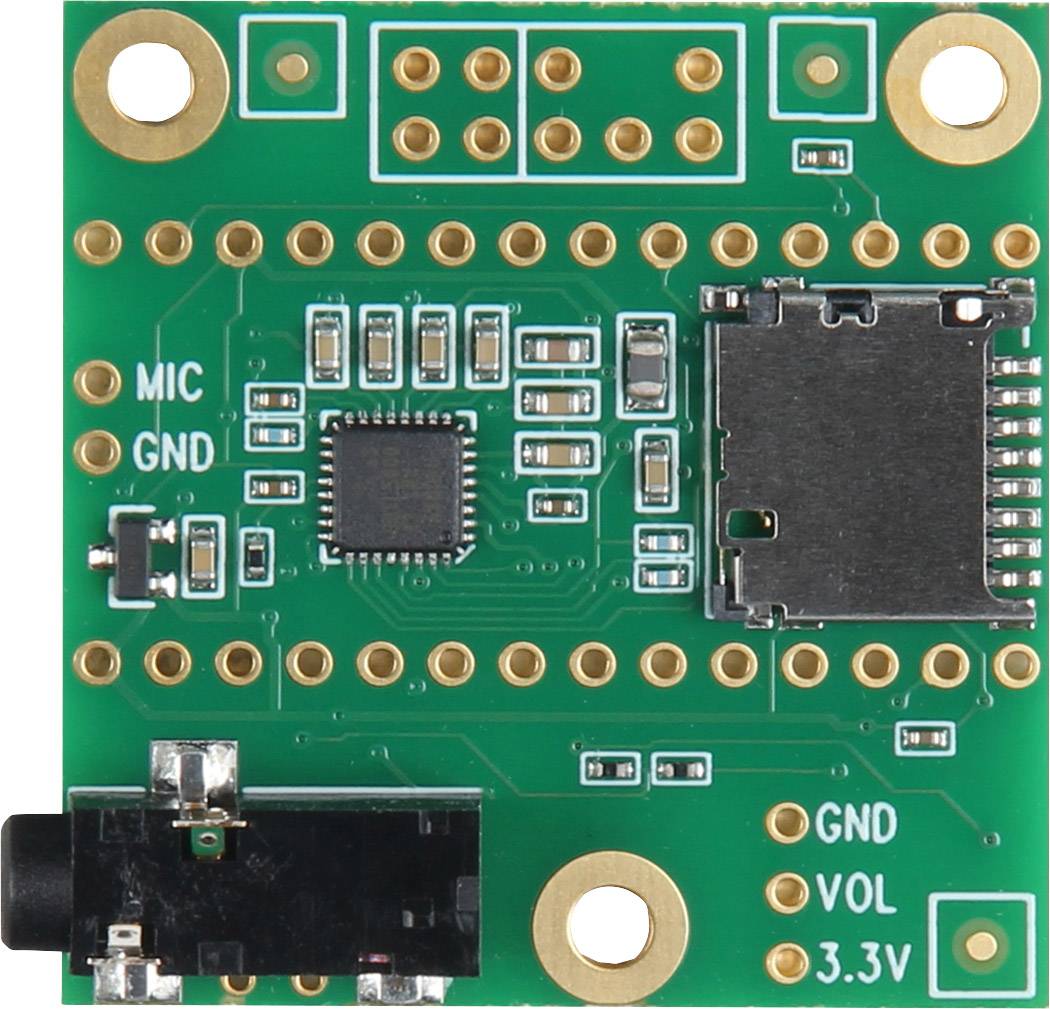 Eine grüne elektronische Platine mit verschiedenen Anschlüssen und einem zentralen Mikrochip. Links ein Mikrofon- und GND-Anschluss.