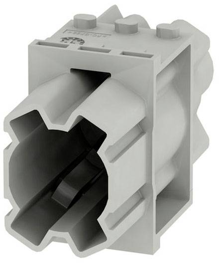 Ein grauer Kunststoffadapter mit sechseckiger Öffnung und strukturiertem Oberbereich. Hauptsächlich für elektronische Verbindungen.