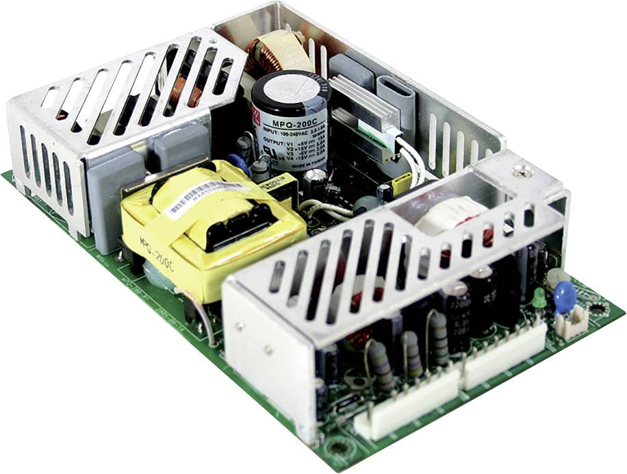 Ein offenes Netzteil mit Kühlrippen, Transformator, Kondensator und Leiterplatte sichtbar, vermutlich für elektronische Geräte.