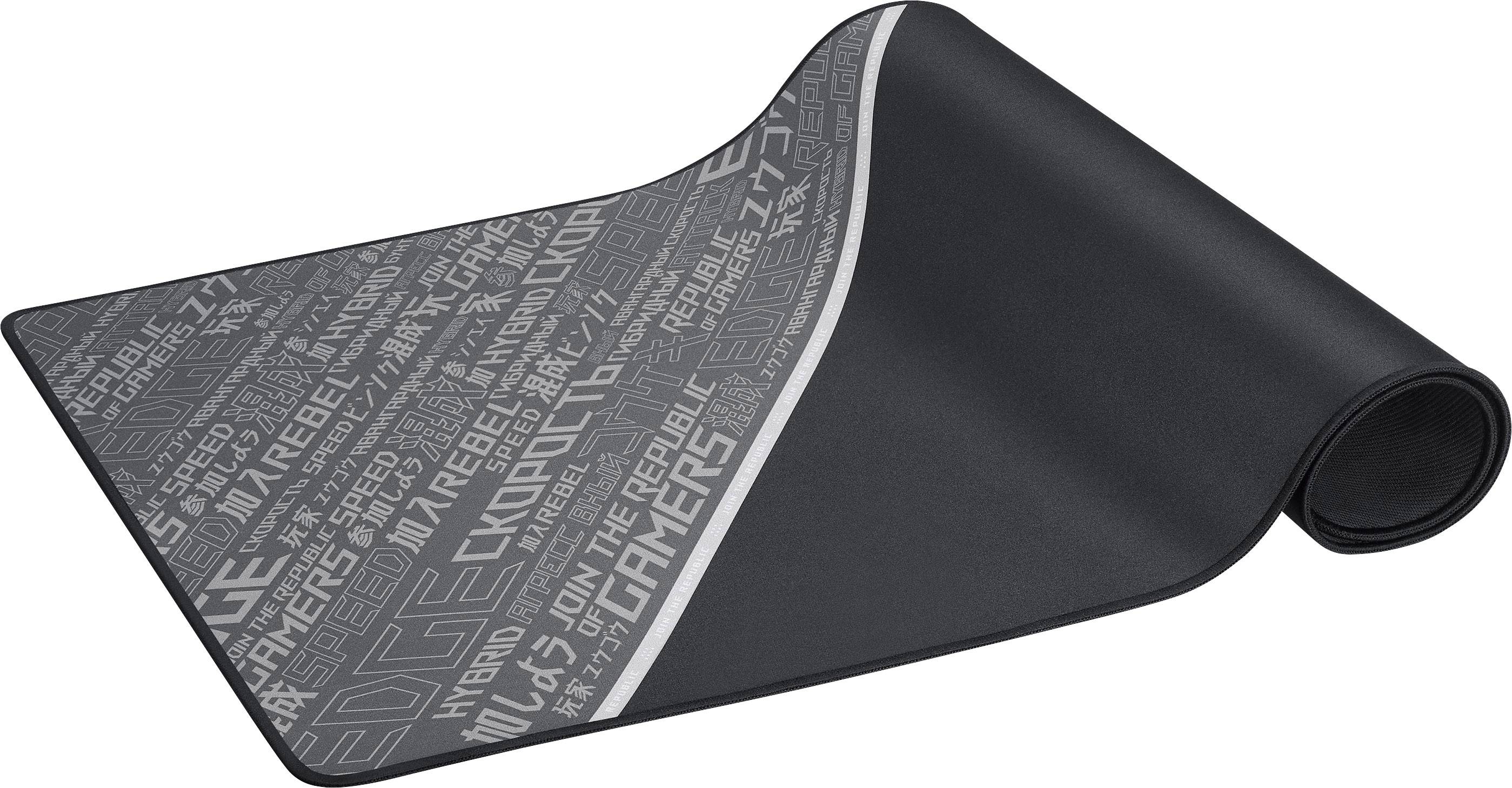 Gleichmäßig ausgerolltes schwarzes Mousepad mit grauen Aufdrucken von Texten und Mustern in verschiedenen Schriftgrößen und Stilen.
