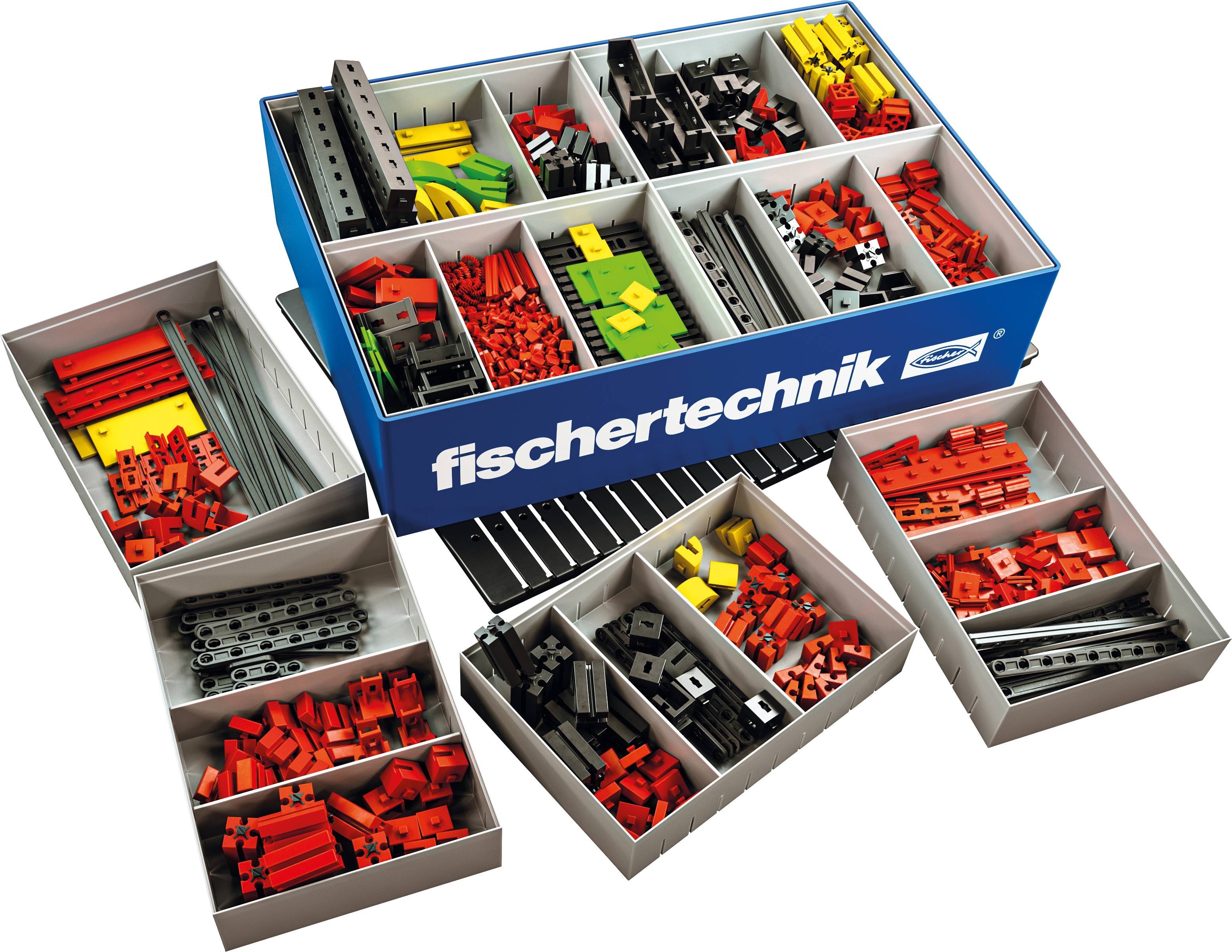 Ein Baukasten von Fischertechnik, gefüllt mit verschiedenen farbigen und geformten Bauteilen, bereit für den Modellbau.