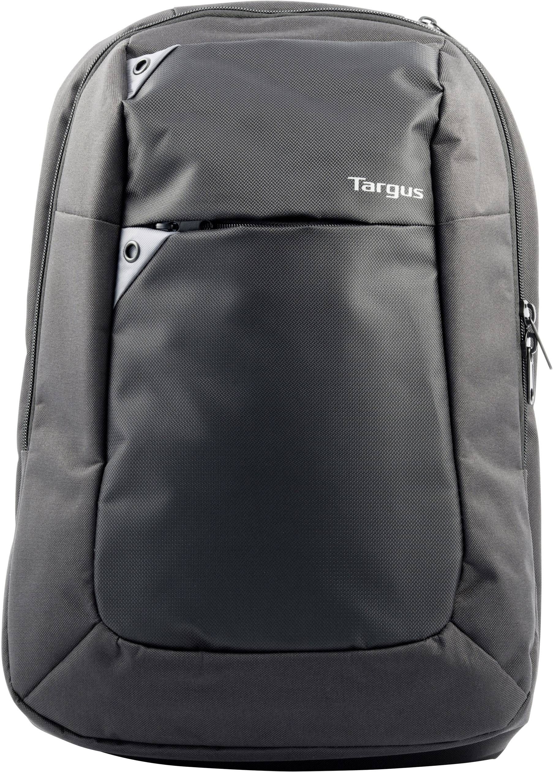 Ein grauer Rucksack mit mehreren Fächern und einem seitlichen Reißverschluss. Auf der Vorderseite steht der Markenname.