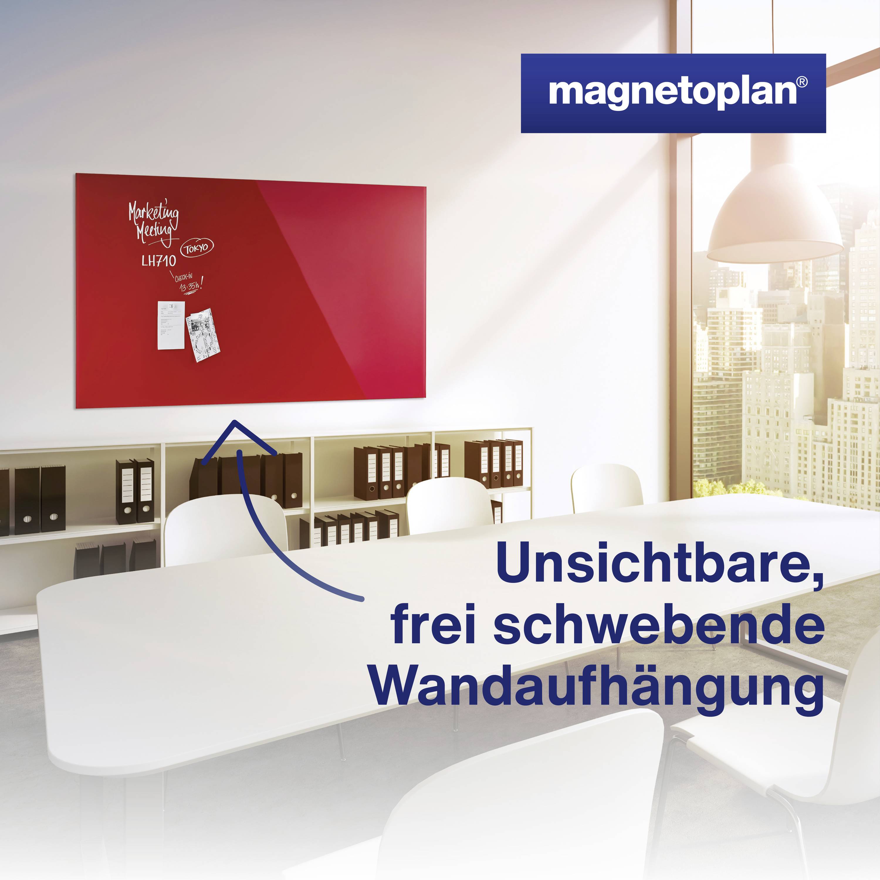 Rotes Whiteboard mit 'Marketing Meeting 11:00' an einer Bürowand. Text: 'Unsichtbare, frei schwebende Wandaufhängung'.