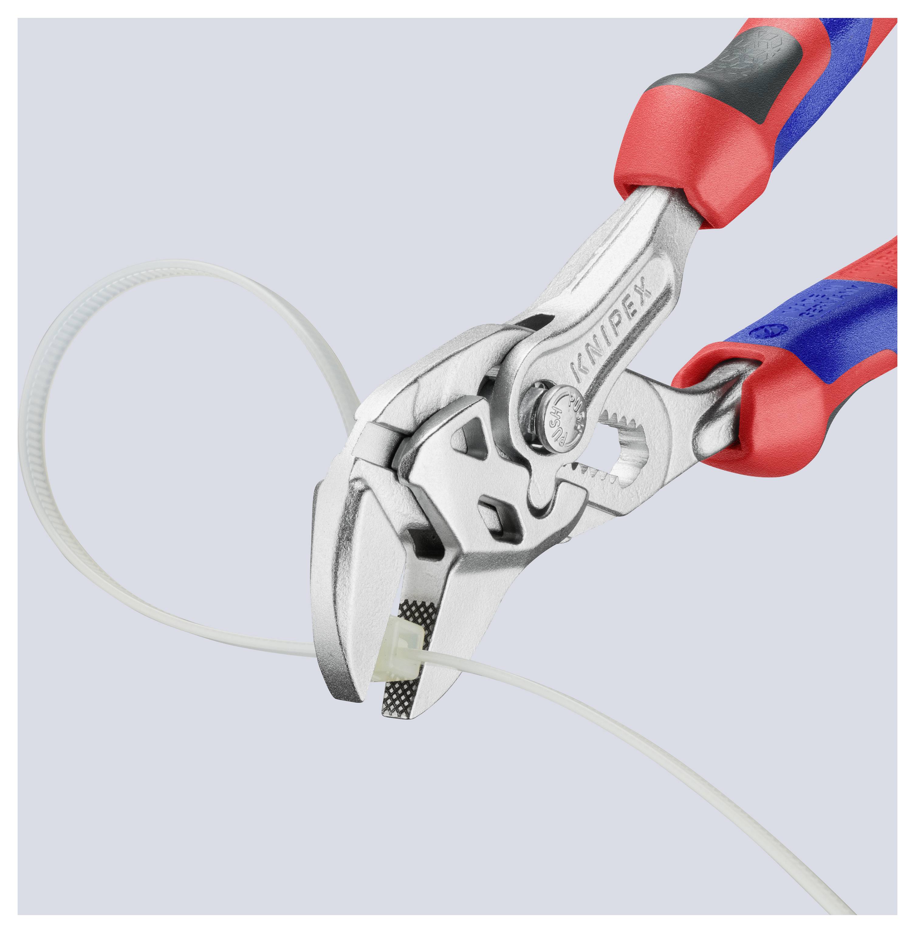 Zange, die ein weißes Kabelbinder durchschneidet, mit sichtbarem Markennamen.