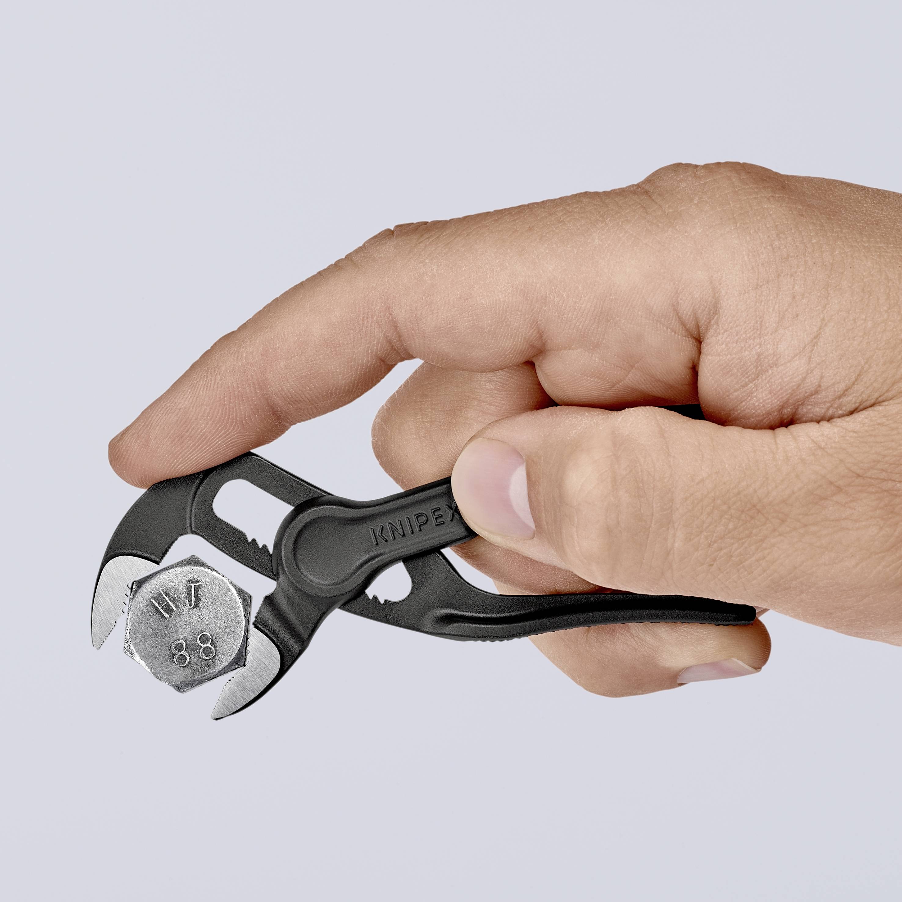Descubre el KNIPEX 87 00 100 XMAS Cobra XS: el alicate ajustable más pequeño de la bola de Navidad