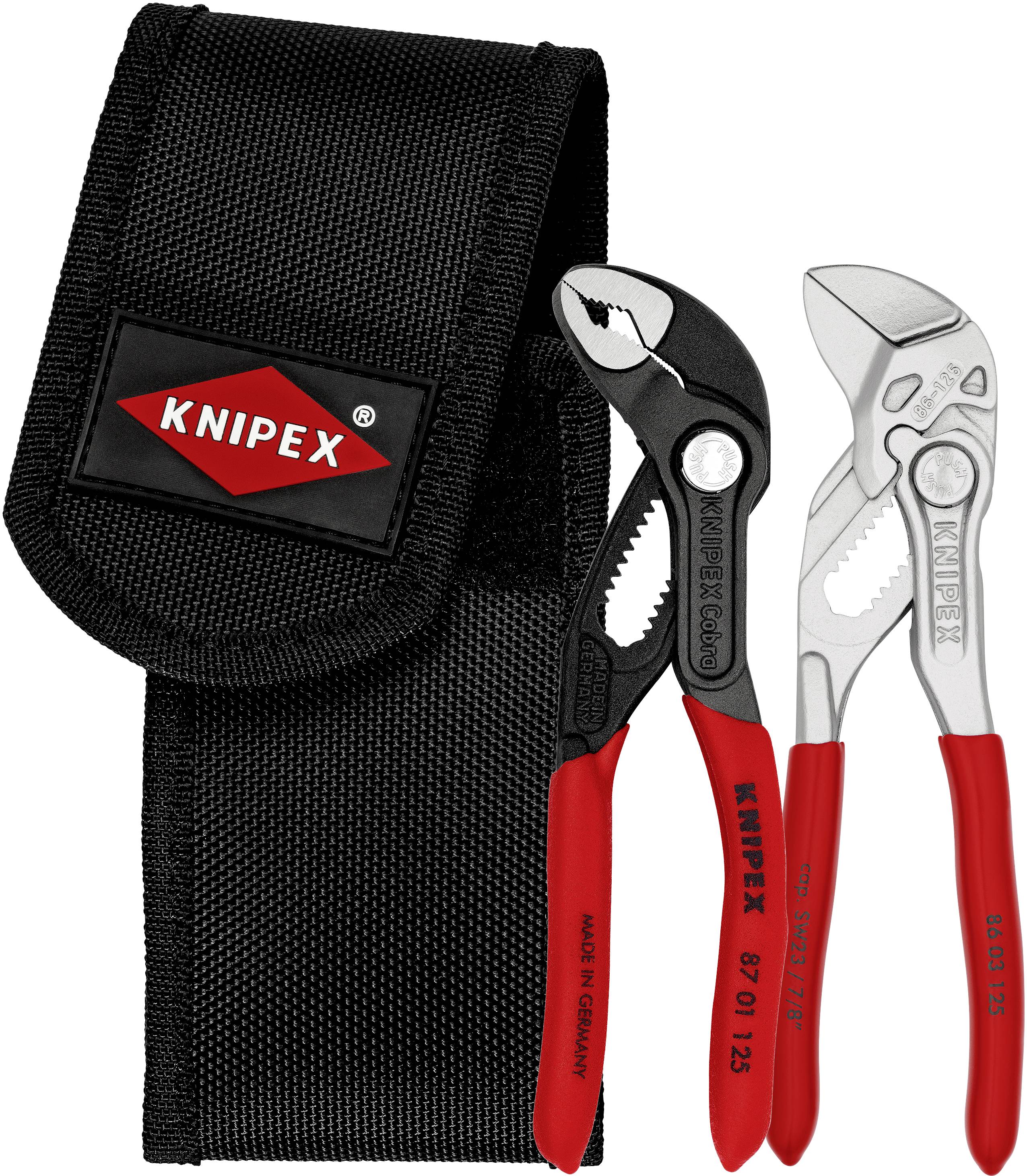 Zwei Zangen mit roten Griffen vor einem schwarzen Etui mit dem Aufdruck 'Knipex', eine schwarz, die andere silbern, nebeneinander liegend.