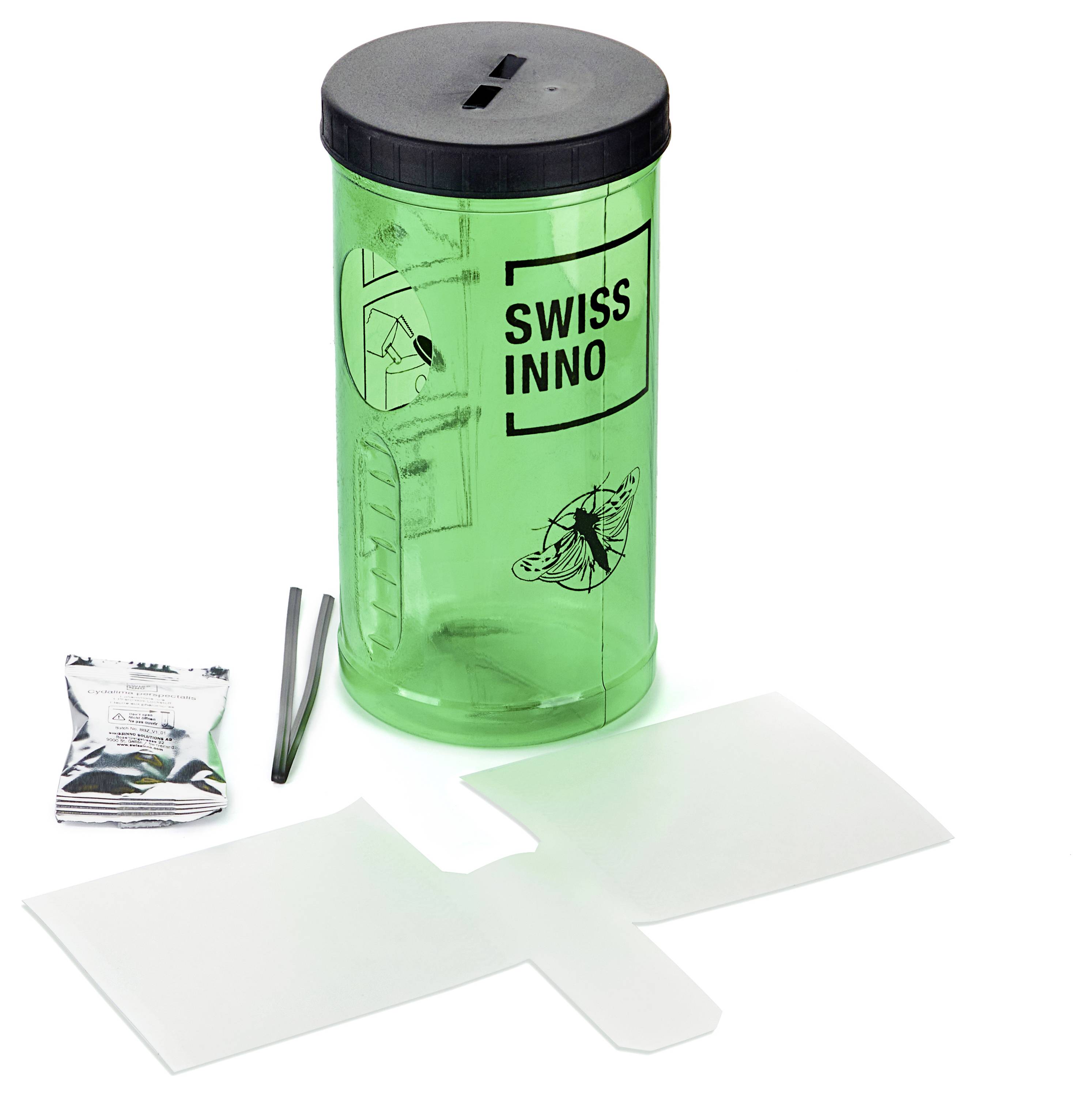 Grüne Wespenfalle mit schwarzem Deckel, beschriftet mit 'SWISS INNO', neben dem enthaltenen Köderpaket und Anleitungsblatt. Entwickelt zum Fangen von Wespen.