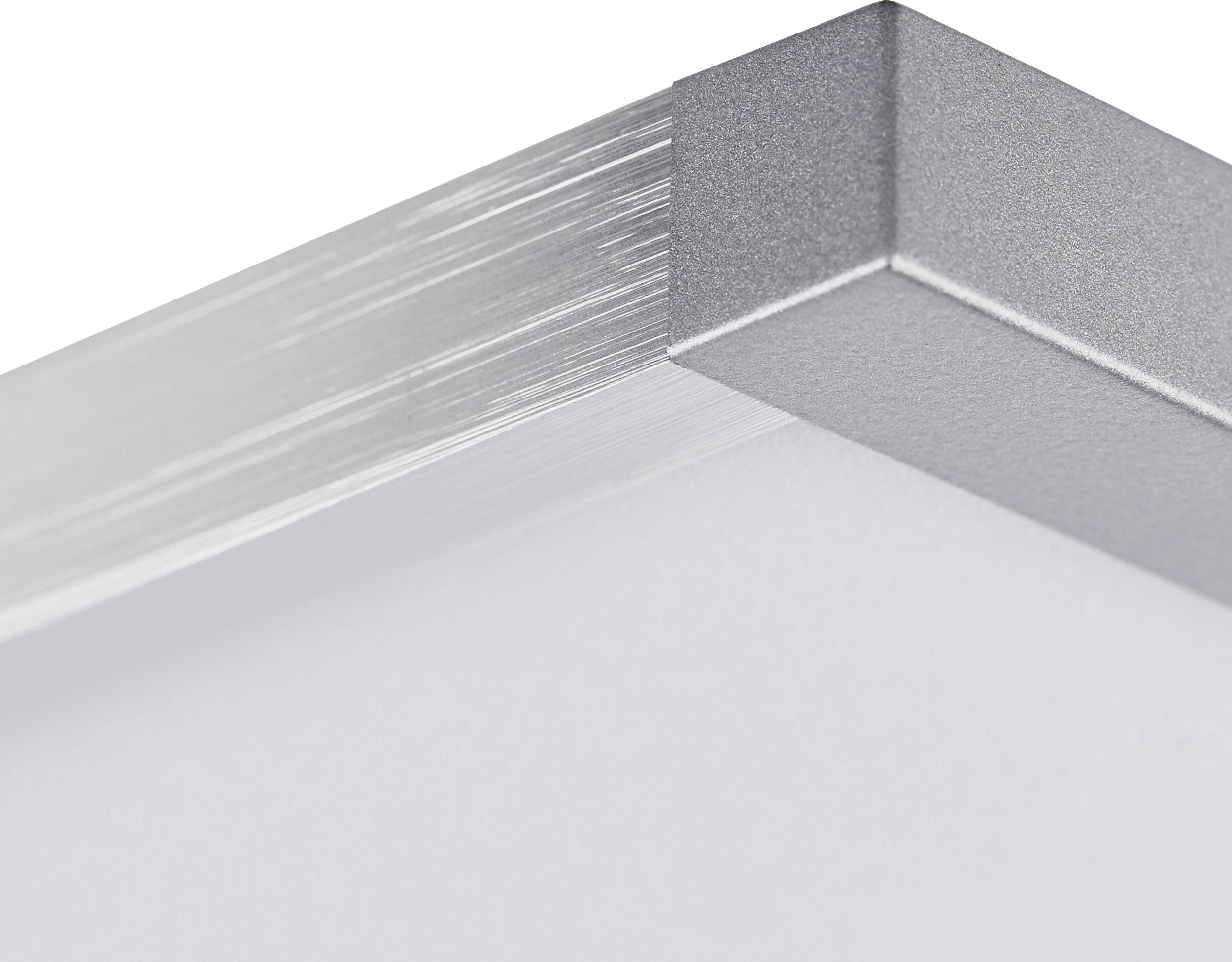 Nahaufnahme eines silbernen Metallrahmens in einem rechten Winkel, der ein schlichtes, weißes Objekt einfasst.