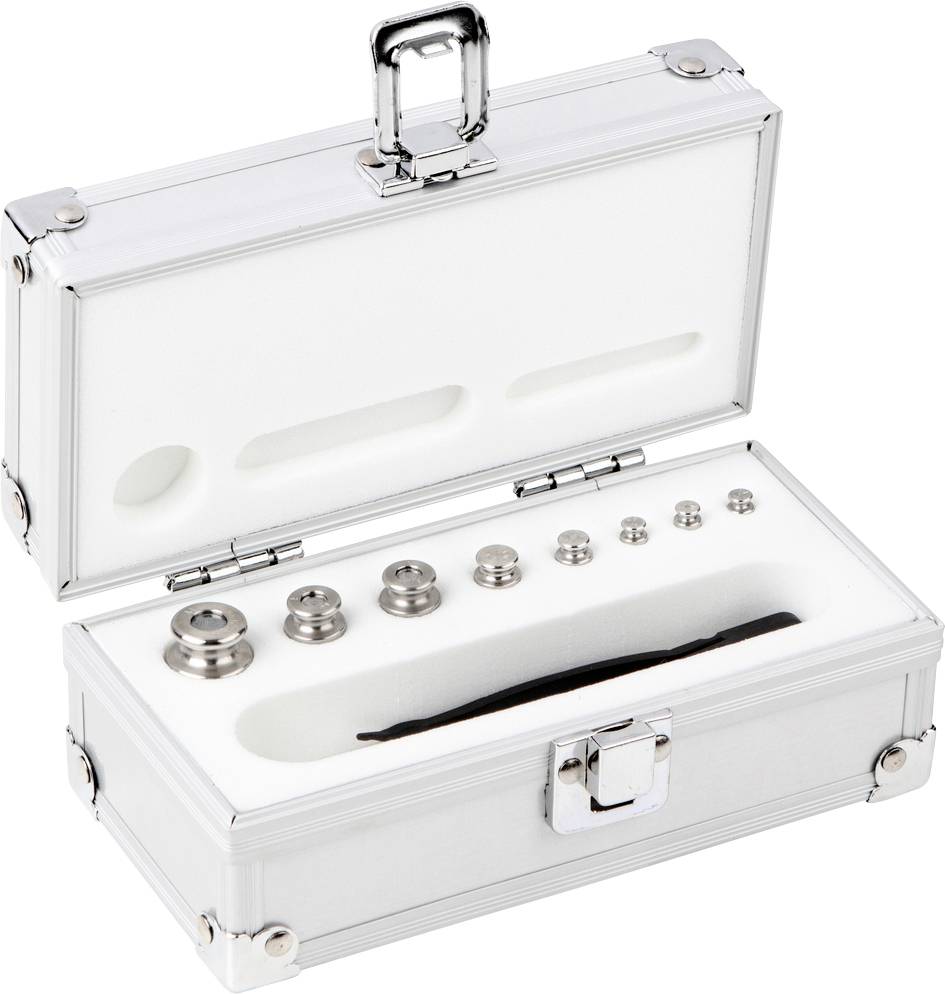 Silberne Box mit geöffnetem Deckel zeigt mehrere kleine Metallgewichte in verschiedenen Größen, angeordnet in Schaumstoffeinlagen.