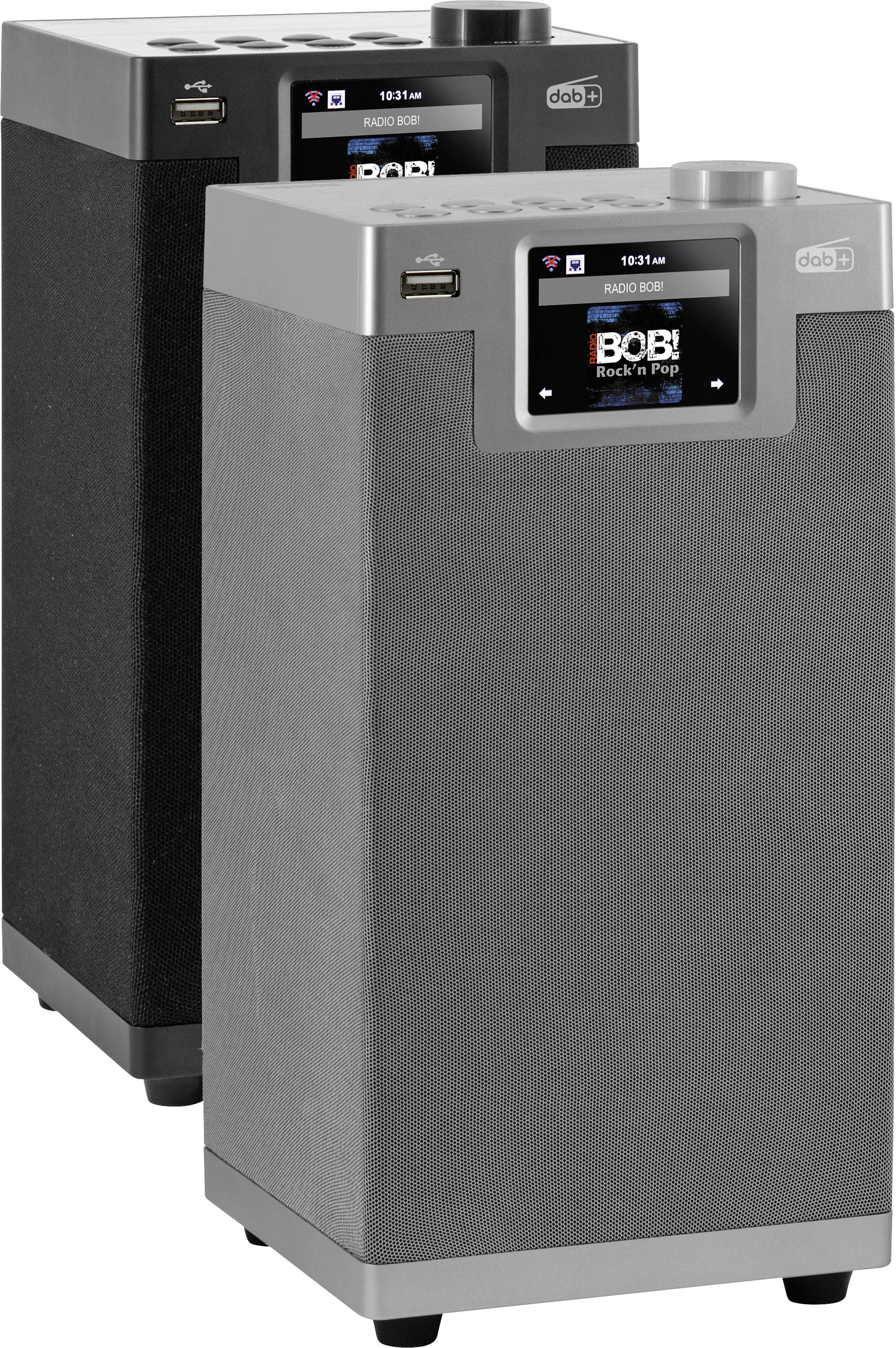 Zwei schwarze Lautsprecher mit grauen Details, Displays zeigen Radiosender 'Radio FM' und 'Bob! Rock n Pop'. USB-Anschlüsse oben.