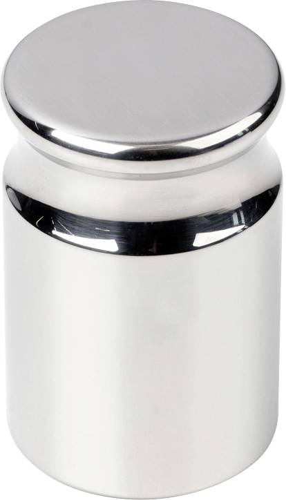 Ein glänzendes, zylinderförmiges Metallgewicht mit flachem Deckel, vor einem neutralen Hintergrund.